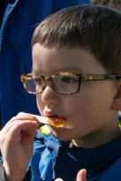 Child enjoying maple taffy